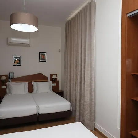 Pensao Praca Da Figueira Guest house 3*